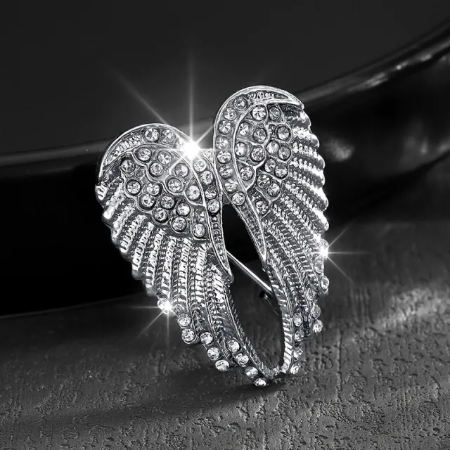 Elegantna broška z angelskimi krili v srebrni barvi